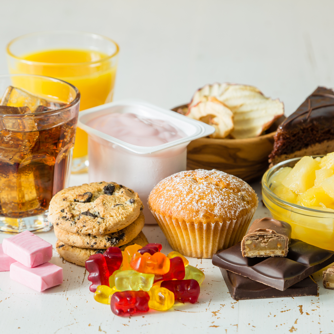Picture showing cookies, candies, and sodas.