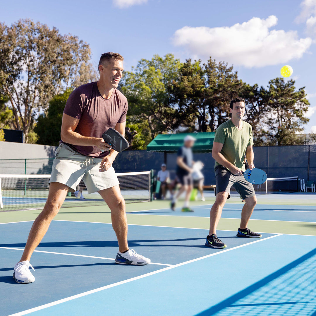 People playing pickleball.